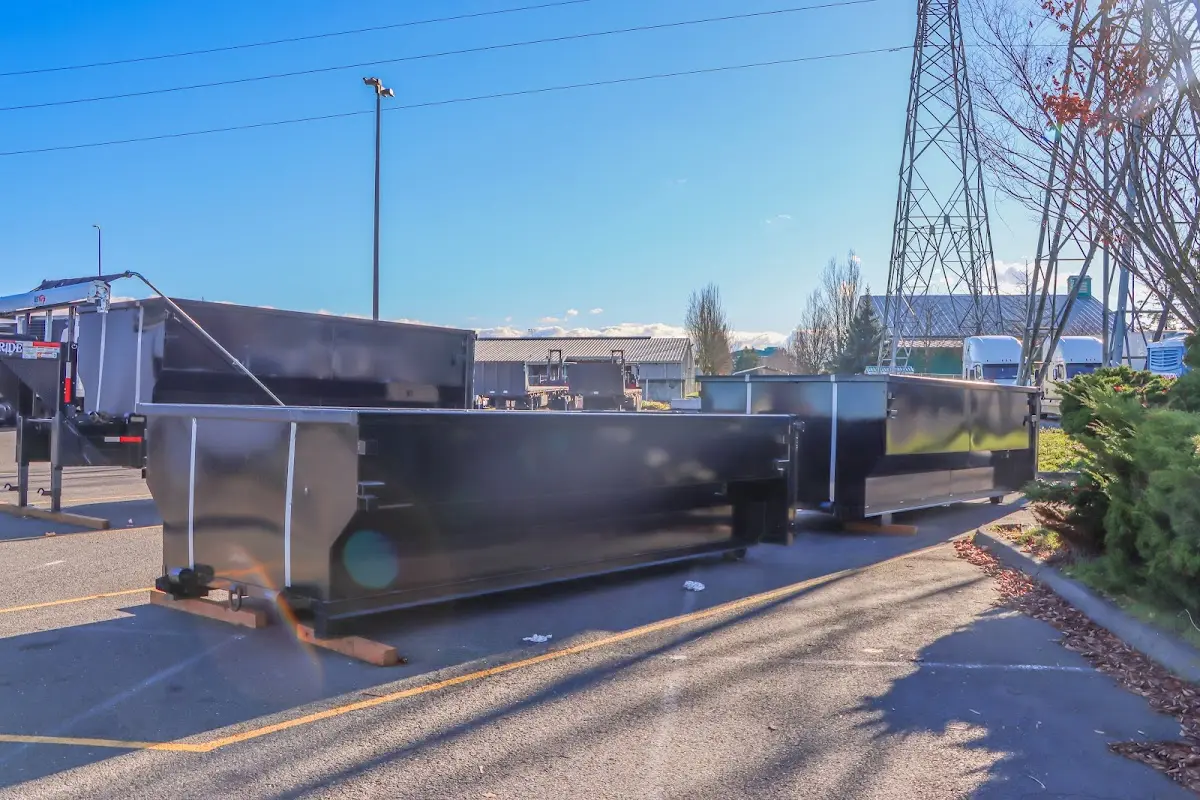 Roll-off dumpster ready for waste disposal at job site for 15 Yard Dumpster Rental in Watertown